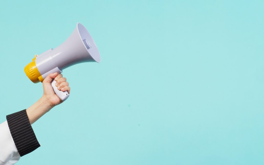 The Best Way to Improve Your Writing: Write in Active Voice: Hand held megaphone image